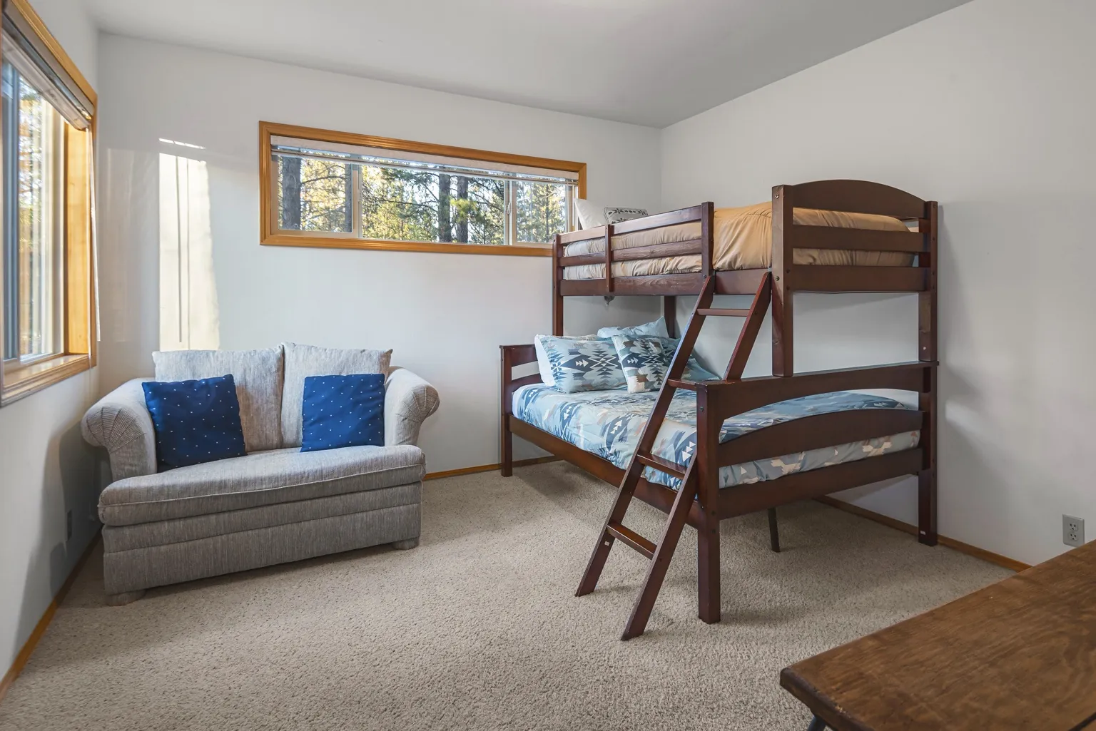 The Ponderosa Room: twin-over-full bunk bed and a loveseat
